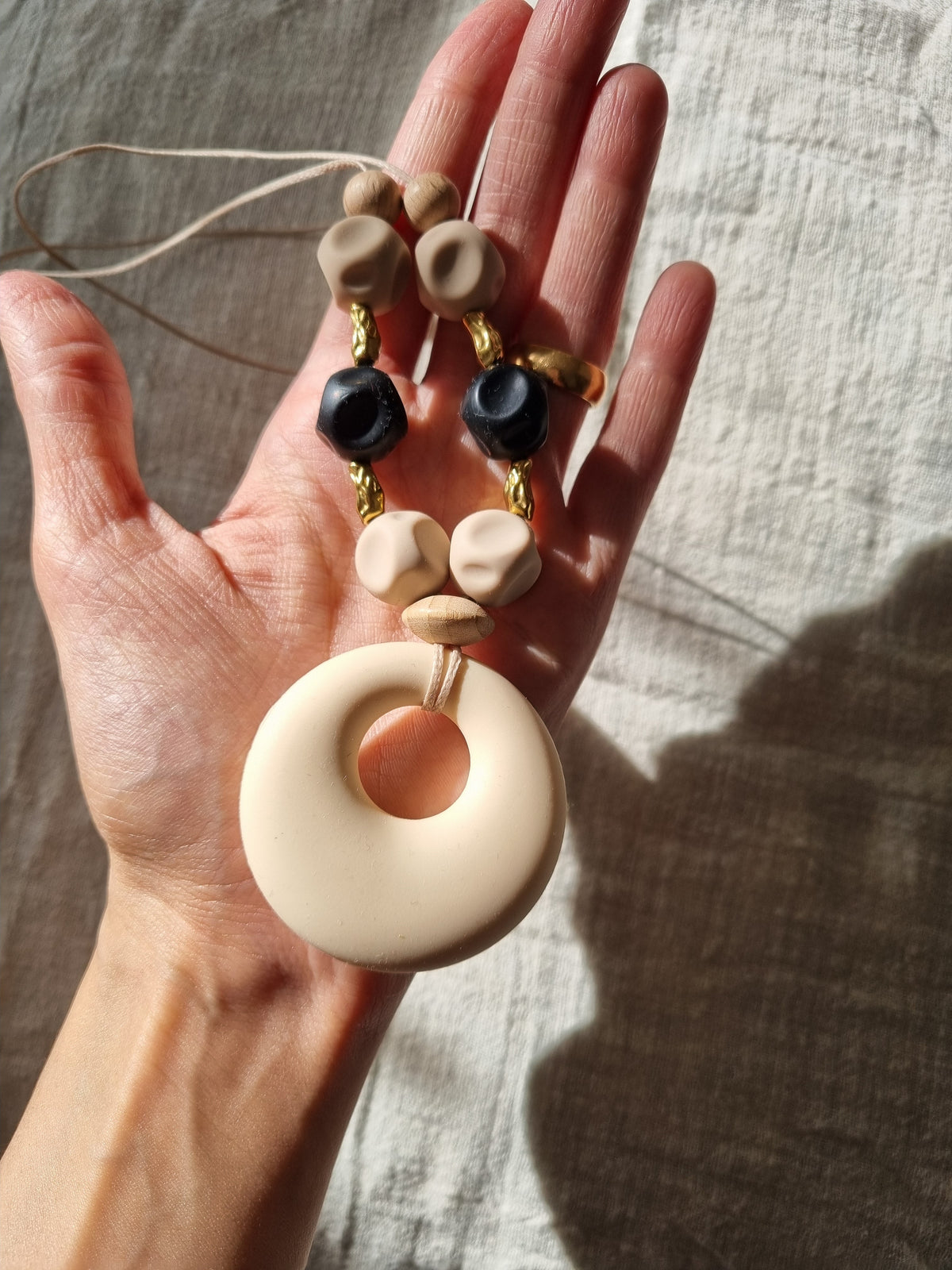 Cream stone shaped silicon nursing necklace